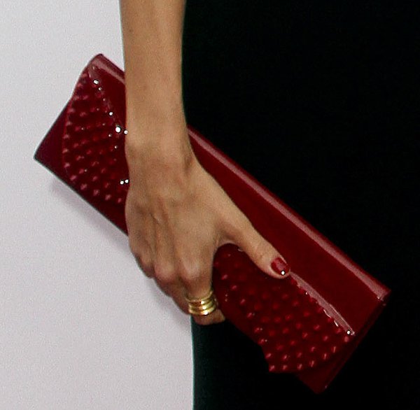 Emma Heming elegantly showcases her Christian Louboutin 'Pigalle' clutch