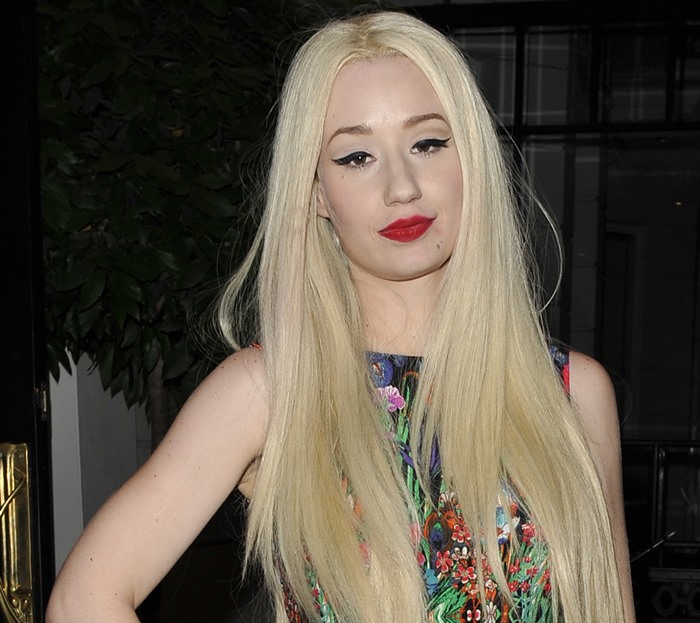 Iggy Azalea wears her long blonde hair down following her performance at G-A-Y nightclub