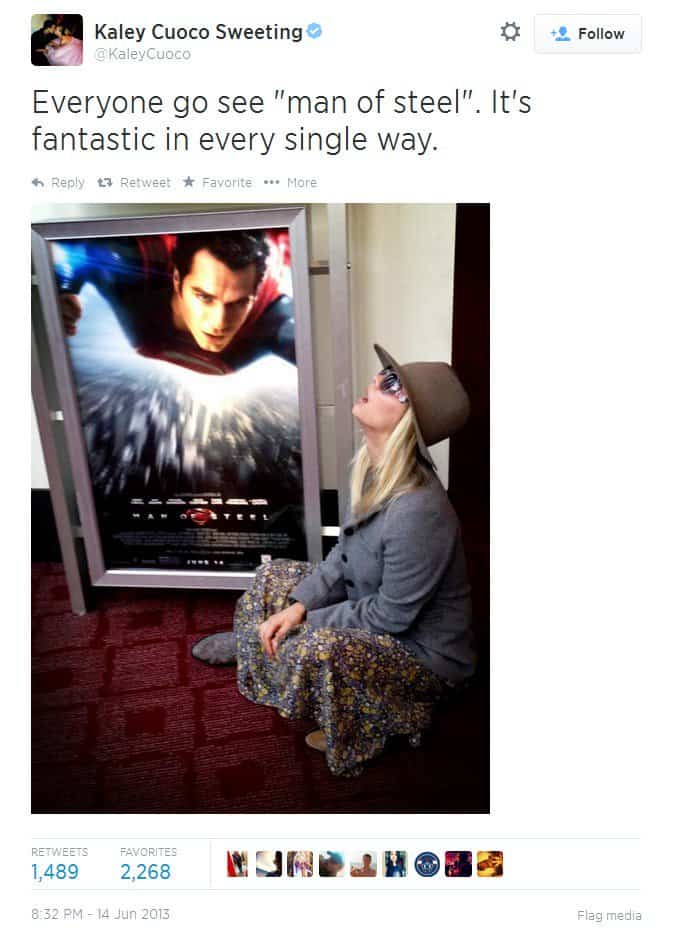 Kaley Cuoco adoringly gazes up at the 'Man of Steel' poster, playfully urging fans to catch the movie