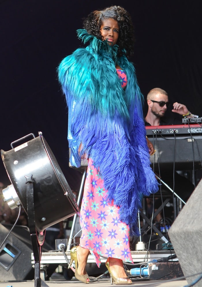 Kelis mesmerizes the crowd at the Lovebox Festival in London with her bold feathered attire, making a statement in style on July 21, 2013