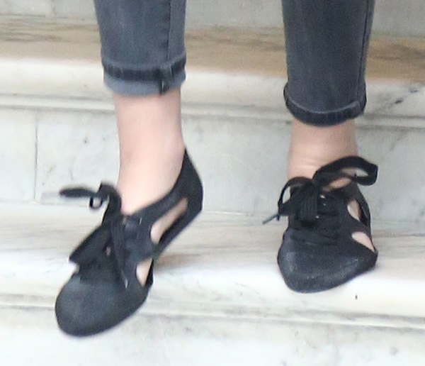 A detailed look at Kristen Stewart's F-Troupe bathing shoes, featuring lace-up fastening and cutouts for added breathability