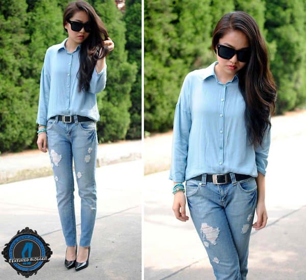 Meijia perfectly pairs a crisp button-down with ripped jeans, achieving a balance of polished and casual
