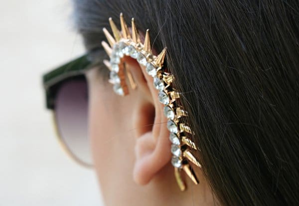 Midheta's crystal-embellished ear cuff features gold-tone spikes