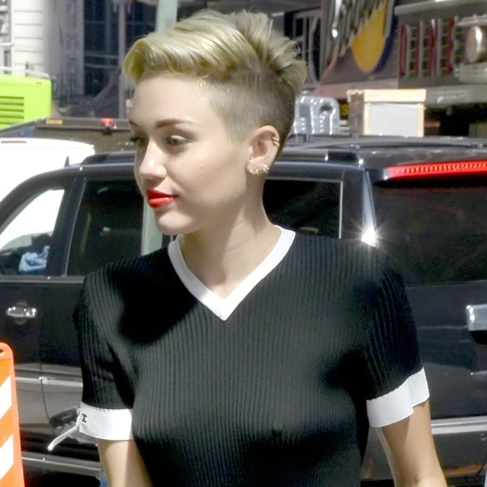 Miley Cyrus opts for a bold mesh bralette top during her Good Morning America appearance