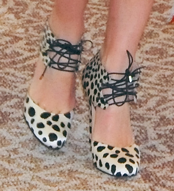 Miranda Kerr wearing leopard-printed crepe satin pumps