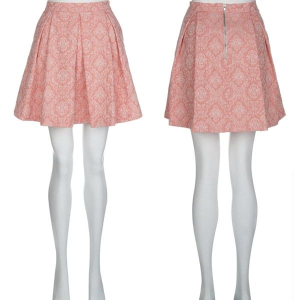 Showcasing the airy elegance of summer, this coral chambray jacquard skirt from New Look offers a perfect blend of comfort and style for the season