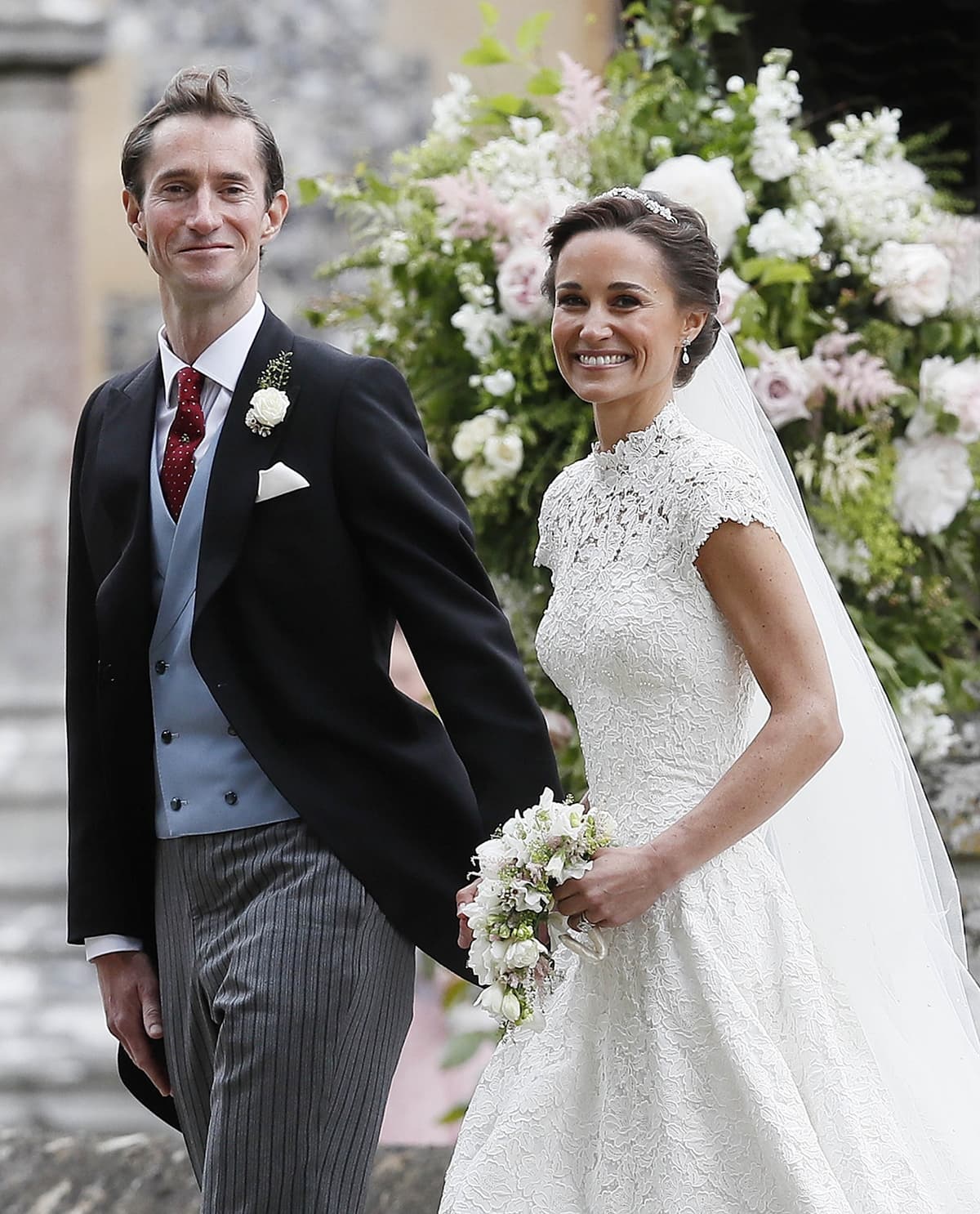 Pippa Middleton married James Matthews in a custom Giles Deacon wedding gown and a bespoke veil by Stephen Jones