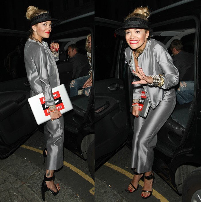 Rita Ora leaving a recording studio in a silver Armani suit in London on July 12, 2013