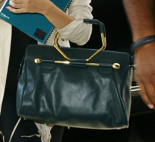 Selena Gomez shows off her favorite Viktor & Rolf Bombette bag
