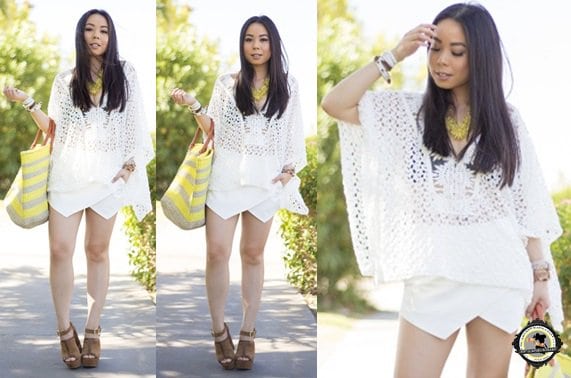 An demonstrates the elegance of a white crochet caftan for summer style