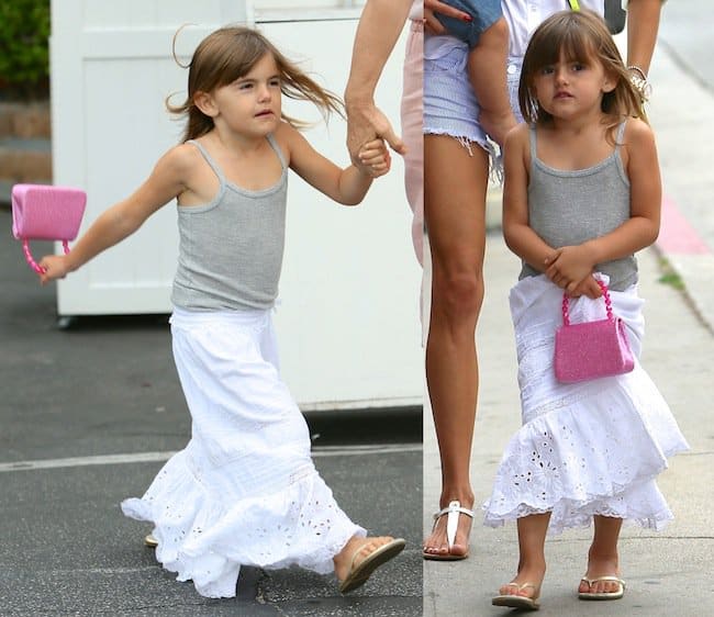 Anja Louise Ambrosio Mazur channels bohemian chic in a gray tank top and flowy white peasant maxi skirt during a family outing in Los Angeles