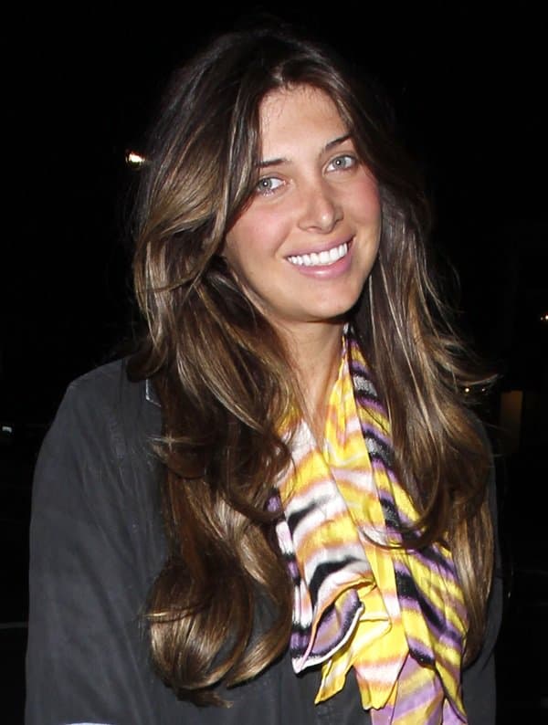 Brittny Gastineau wears a sunny yellow scarf as she leaves STK Restaurant in Los Angeles