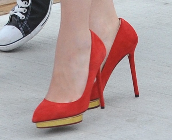 Emilia Clarke shows off her feet in red Charlotte Olympia Debbie pumps