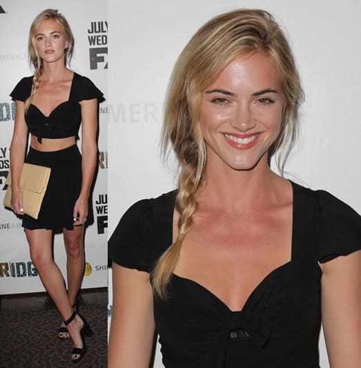 Emily Wickersham pairing her black combo look with white nail polish and an extra-large woven envelope clutch for The Bridge