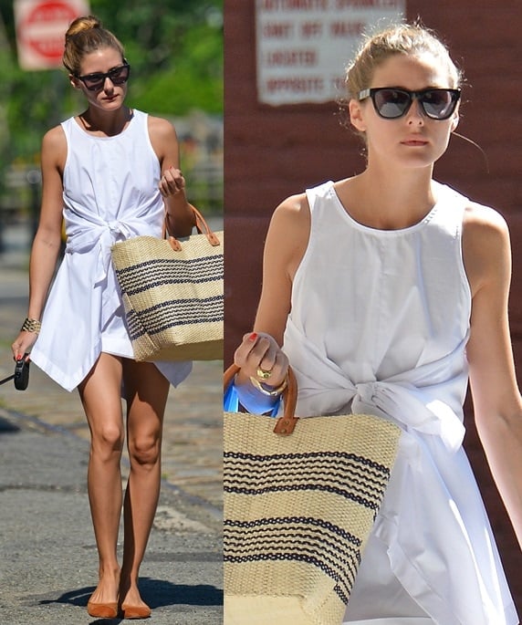 Olivia Palermo looking summer chic in a white dress and easy flats in New York City