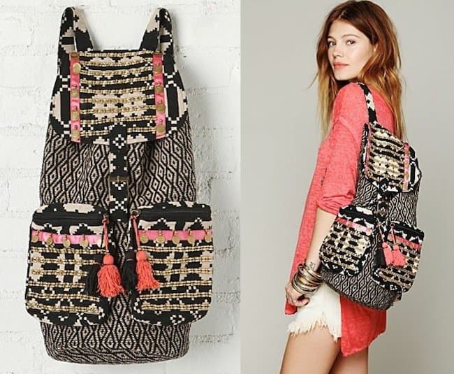 Detailed view of the Stela 9 'Ventura' backpack featuring intricate tribal patterns and gold embellishments