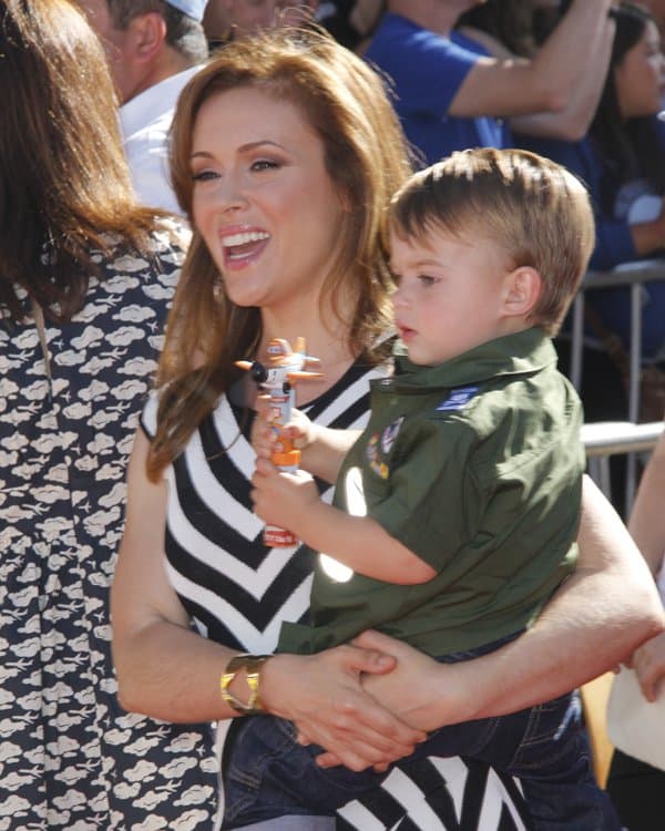 Alyssa Milano and her son Milo Thomas Bugliari at the red carpet premiere of Disney's Planes