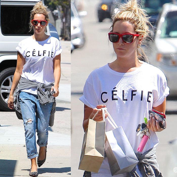 Ashley Tisdale wears her hair up in a messy bun while on her way to work in Los Angeles
