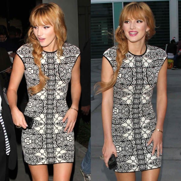 At the 'The Mortal Instruments: City of Bones' LA premiere, Bella Thorne captivated in an Alexander McQueen sleeveless chenille dress, inspired by the artistry of stained-glass windows, embodying a fusion of tradition and modernity