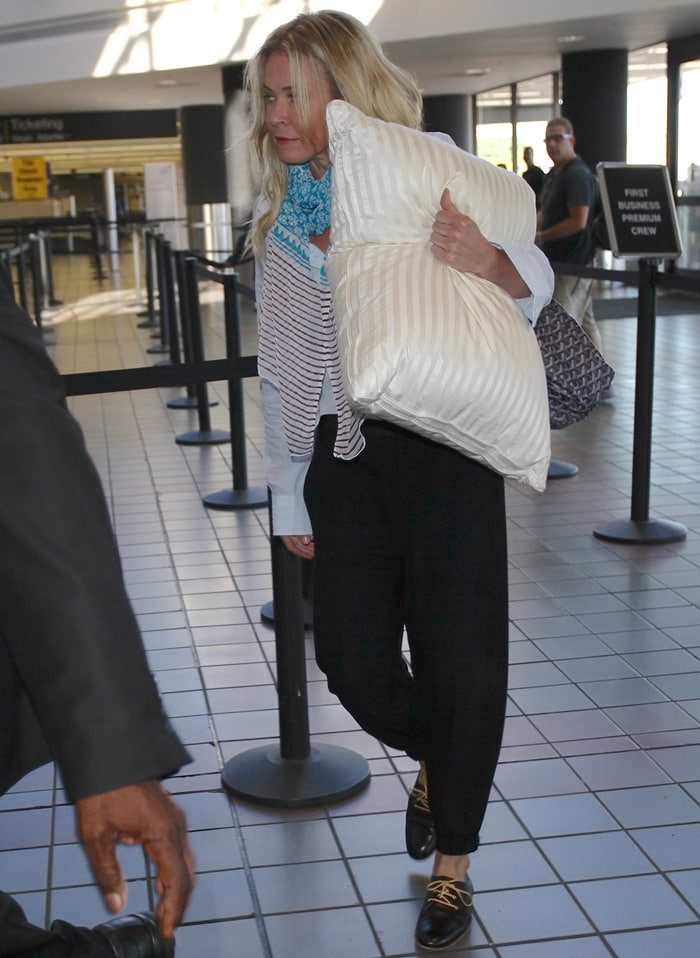 Chelsea Handler was dressed casually in loose trousers and a white shirt for her plane ride