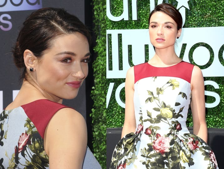 Captured on the red carpet, Crystal Reed dazzles in a sleeveless floral jacquard party dress at the 2013 Young Hollywood Awards, held at The Broad Stage in Los Angeles on August 1, 2013
