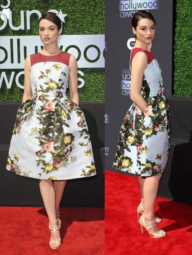 Crystal Reed exudes elegance at the Young Hollywood Awards in a Carolina Herrera dress featuring a contrast solid front yoke, dropped waist, and voluminous pleated skirt