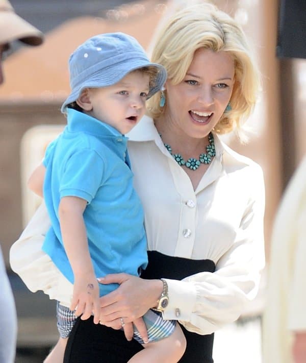 Elizabeth Banks shares a moment with her son Felix on the set of 'Love & Mercy' in West Hollywood, highlighting the blend of her professional and personal life on August 18, 2013
