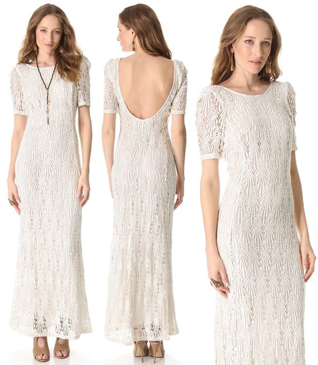 The elegant weight of guipure lace lends antiqued appeal to this Faith Connexion dress, which is composed in a simple silhouette with an alluring, low-cut back