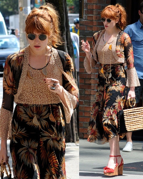 Florence Welch wearing a waist-length necklace and oversized rings in Manhattan on August 2, 2013