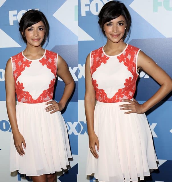 Hannah Simone radiates charm in her white-and-coral outfit at the 2013 Fox Summer TCA All-Star Party in Los Angeles