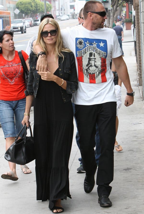 Heidi Klum enjoying a romantic and carefree afternoon with Martin Kristen in Los Angeles, showcasing her effortless style in a designer dress