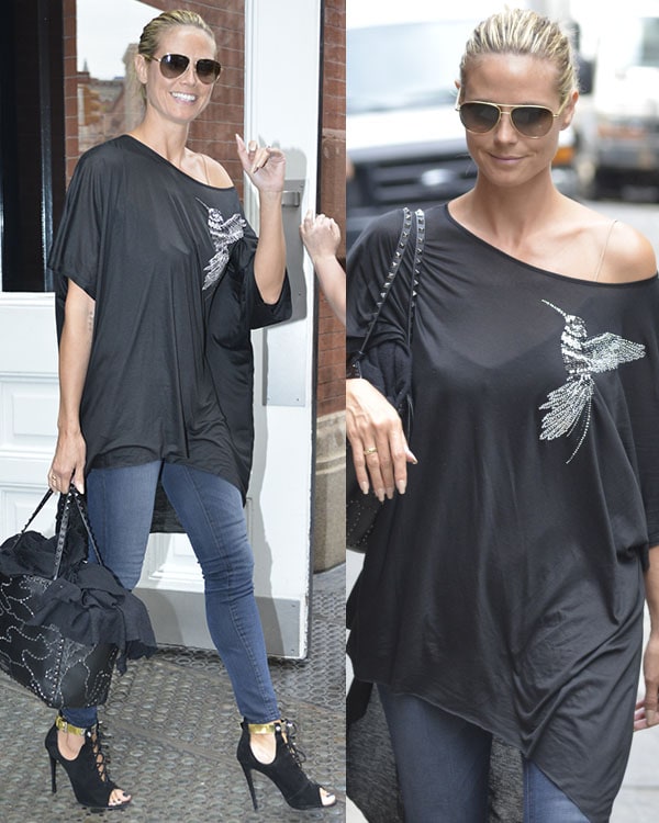 Heidi Klum wearing a stylish black blouse and skinny jeans in Manhattan on July 31, 2013