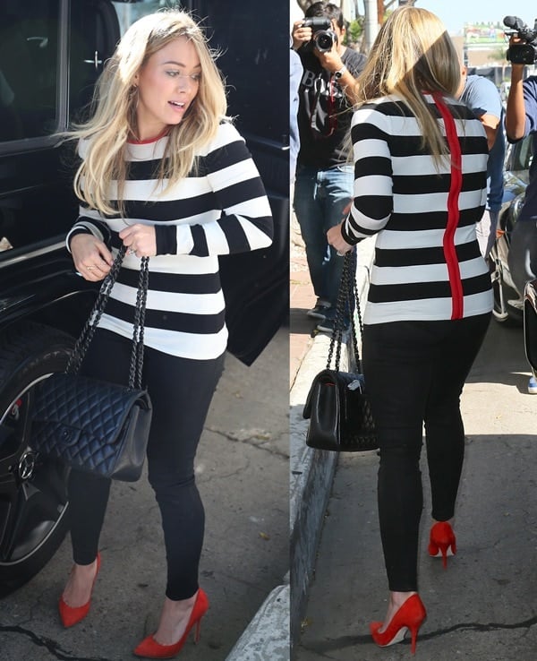 Hilary Duff rocks skinny black jeans and a long sleeve black & white striped top