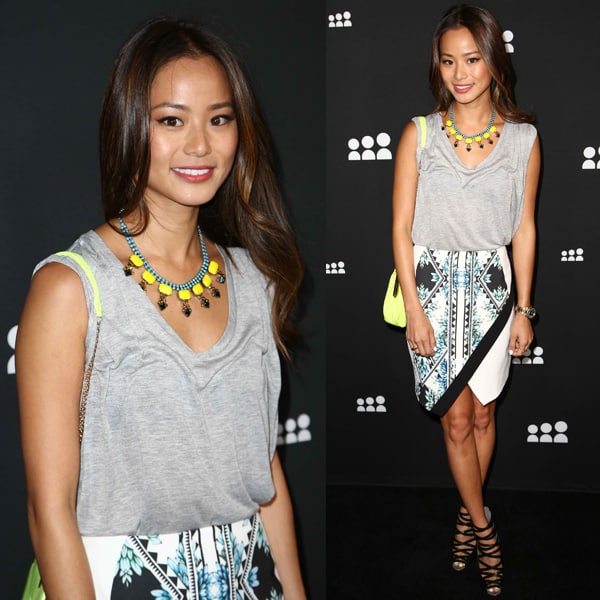 Jamie Chung showcases a casual chic style with a grey top and a lively printed skirt at the MySpace event, El Rey Theatre, Los Angeles