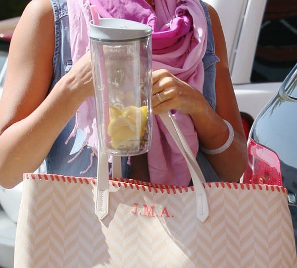 A closer look at Jessica Alba’s Misela 'Edna' tote, personalized with her initials J.M.A., showcasing the trendy chevron design in beige and white