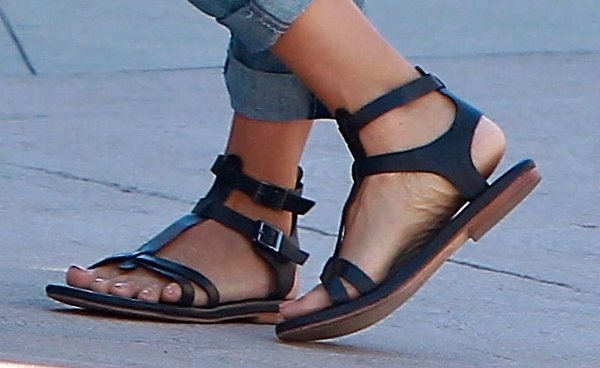 Jessica Alba's black Matt Bernson gladiator sandals add a stylish touch to her West Hollywood shopping ensemble