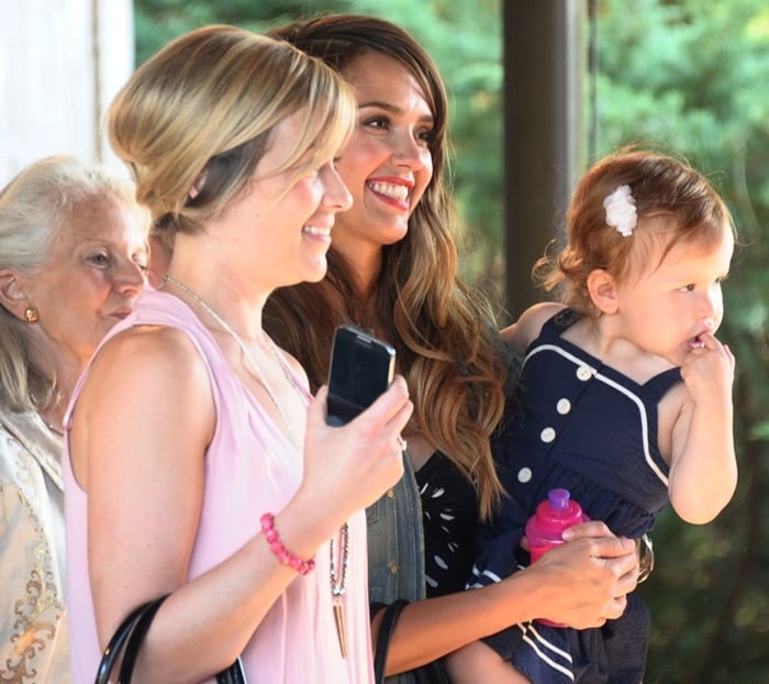 Jessica Alba and daughter Haven attend Ralph Lauren’s Day at the Stables fashion show to preview the Fall/Holiday 2013 collection at Wölffer Stables in Sagaponack, New York, on August 5, 2013