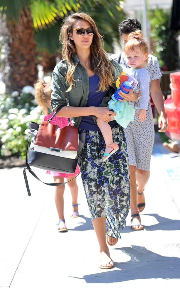 Jessica Alba in a Laid-back Ensemble: Featuring an army-style jacket and a printed maxi skirt at Le Pain