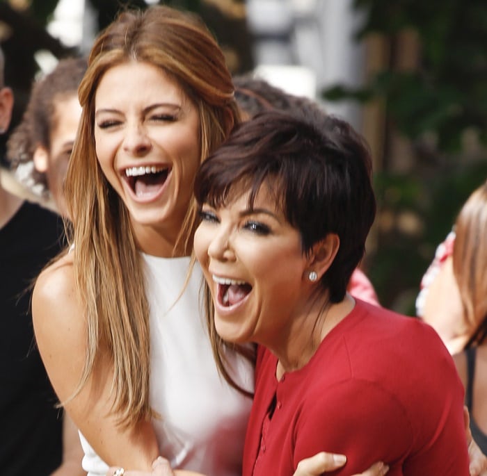 Kris Jenner, pictured with Maria Menounos, looking happy and gorgeous in her interview with Extra on August 20, 2013