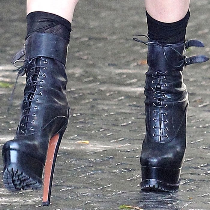 Lady Gaga wears black Alaia leather lace-up platform boots