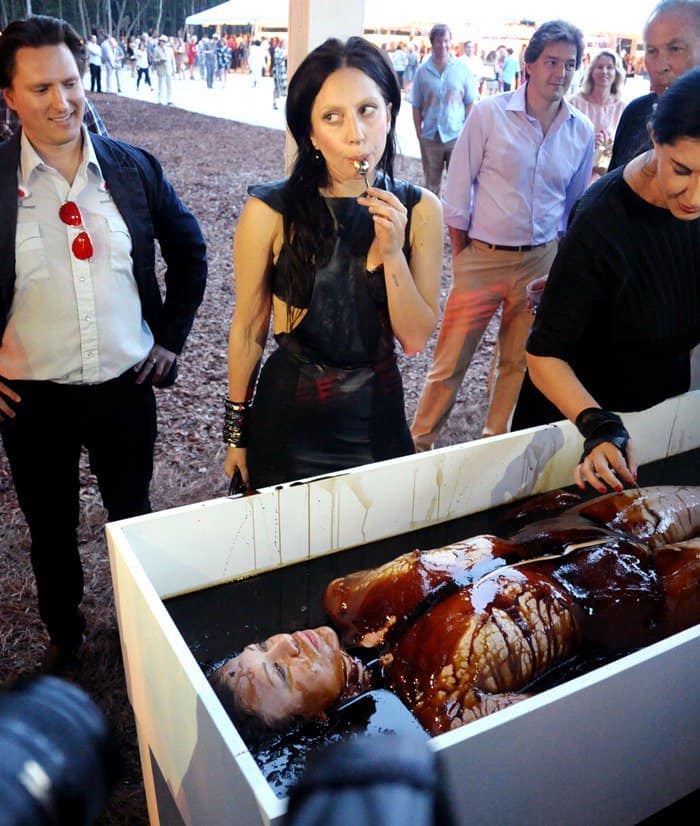 Lady Gaga alongside artist Marina Abramovic at the 20th Annual Watermill Center Summer Benefit, showcasing a natural look