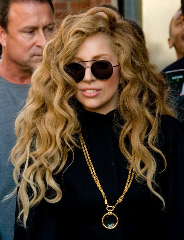 Lady Gaga's Chanel "Loupe" gold magnifying glass necklace
