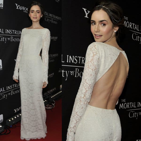 Lily Collins in a white lace dress by Houghton at the premiere of The Mortal Instruments: City of Bones