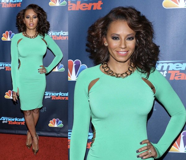 Mel B showing off her curves in a form-fitted dress