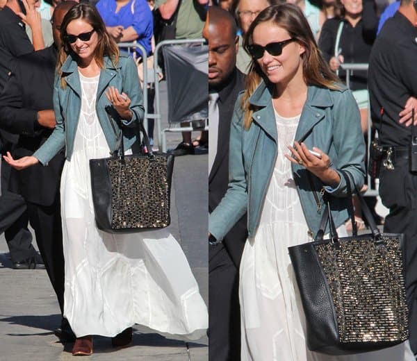 On her appearance on Jimmy Kimmel Live on August 7, 2013, Olivia Wilde styled a petrol blue Mih leather biker jacket, paired with H by Hudson Encke ankle boots and accessorized with a Christian Louboutin Panettone spiked shopper tote