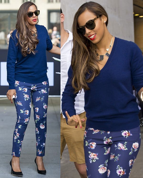 Rochelle Humes exudes elegance in a coordinated ensemble featuring a navy sweatshirt, sleek black pumps, and vibrant floral pants, as seen leaving BBC Radio 1