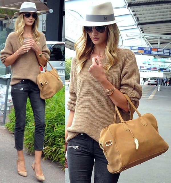 Rosie Huntington-Whiteley carries a camel Balmain x Aurelie Bidermann “Pierre” bag