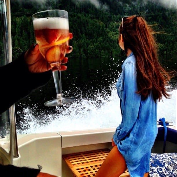 Selena Gomez on a boat in a Kyley Tencel denim tunic dress from Rails