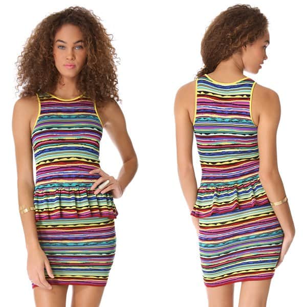 Rainbow stripes in zigzags and lines give a formfitting dress a vibrant look, and a flared peplum is a girly accent