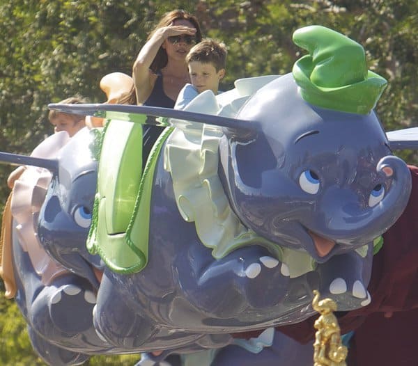 Victoria Beckham delights in the magical Dumbo the Flying Elephant ride at Disneyland